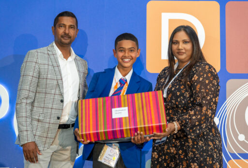 Young innovator takes on restroom woes with paper recycling machine at Eskom Expo